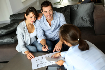 Couple signing financial terms for future property